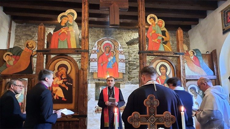 Bishop Philippe Jourdan speaks at the prayer service