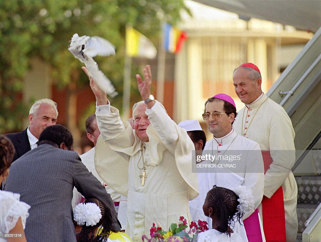 Pope John Paul II lets a dove loose upon his arrival 30 January 1990...  News Photo - Getty Images