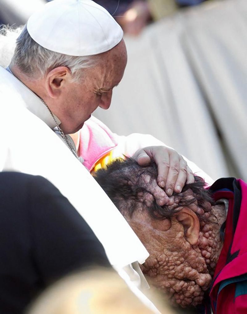 Pope Francis hugs Riva in Saint Peter's Square at the end of his general audience in Vatican City on Nov. 6.