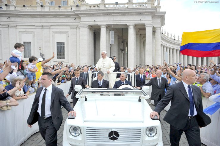 Pope Francis greets the faithful at his weekly general audience