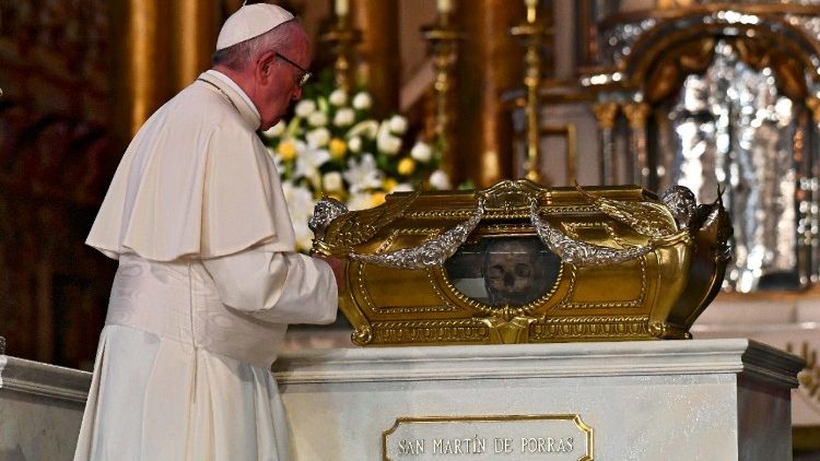Pope Francis prays before the relics of Peru's Saints in Lima's Cathedral