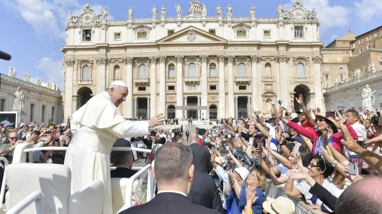 Pope Francis greets pilgrims in St Peter's Square before the weekly General Audience