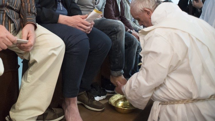 Pope Francis washing feet on Holy Thursday, 2013