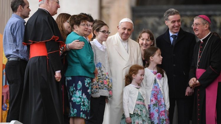 Pope Francis poses with Irish families during a general audience in St Peters Square