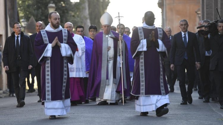 Pope Francis leads a penitential procession to the Basilica of Santa Sabina